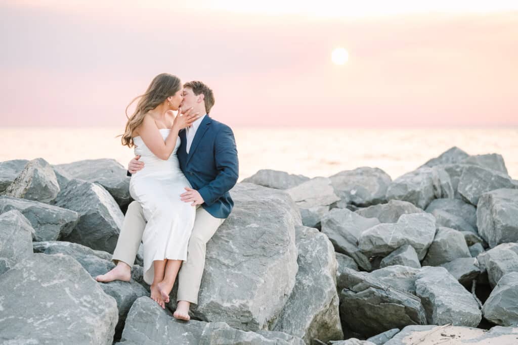 Bride and Groom embrace and kiss for photos at Sunset at The Grand Hotel