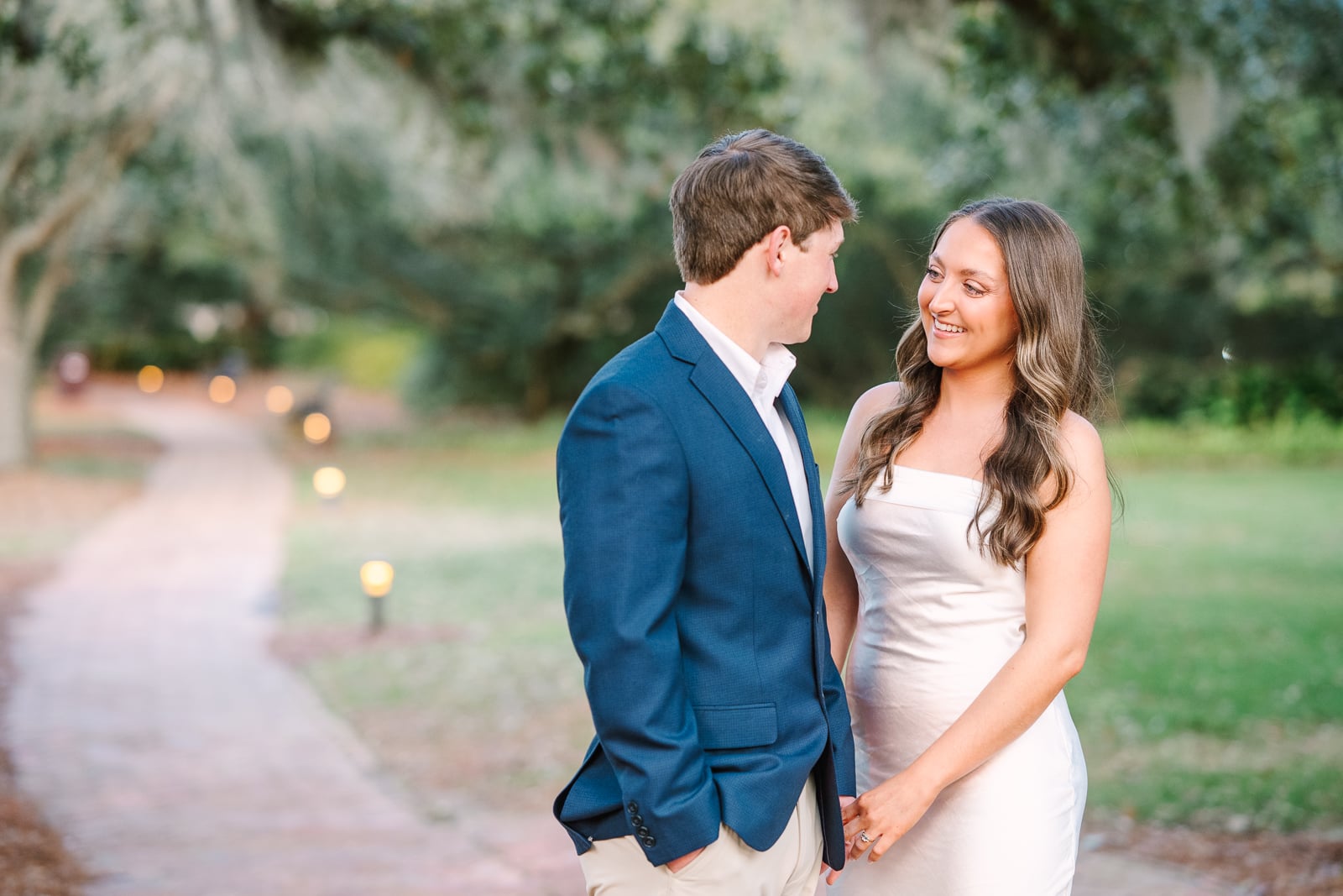 bride looks at Groom during engagement photos