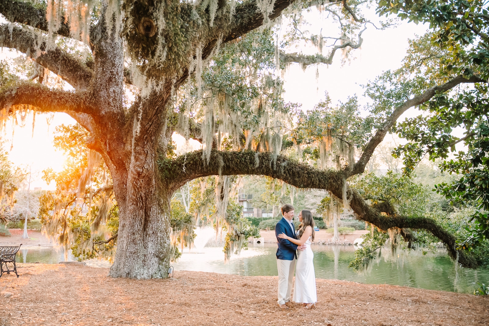 Couple embraces for engagement photos at the Grand Hotel in Fairhope Al