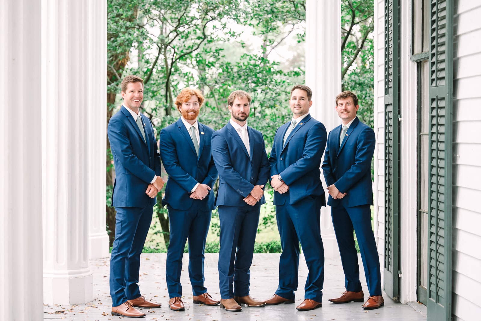 Groom with other men at the Bragg Mitchell Mansion