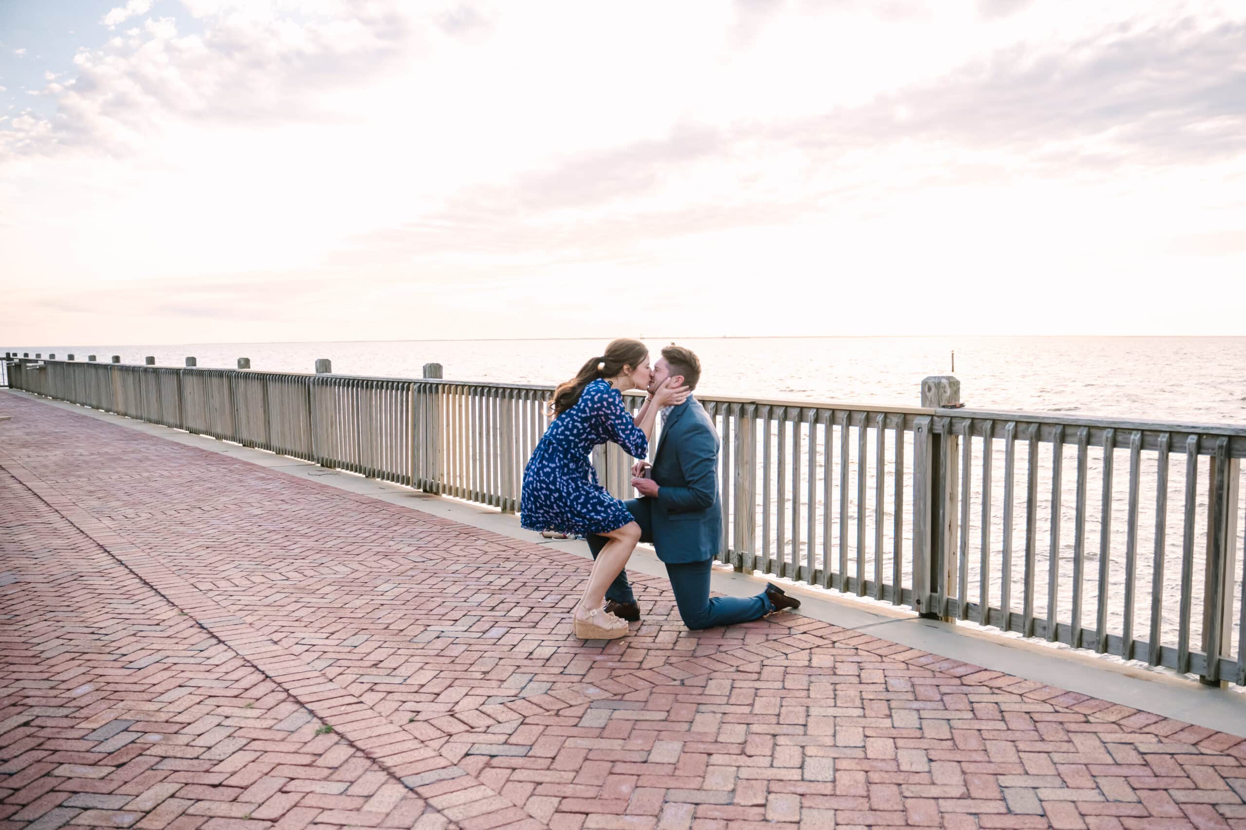 Couple kisses during proposal in Fairhope Alabama